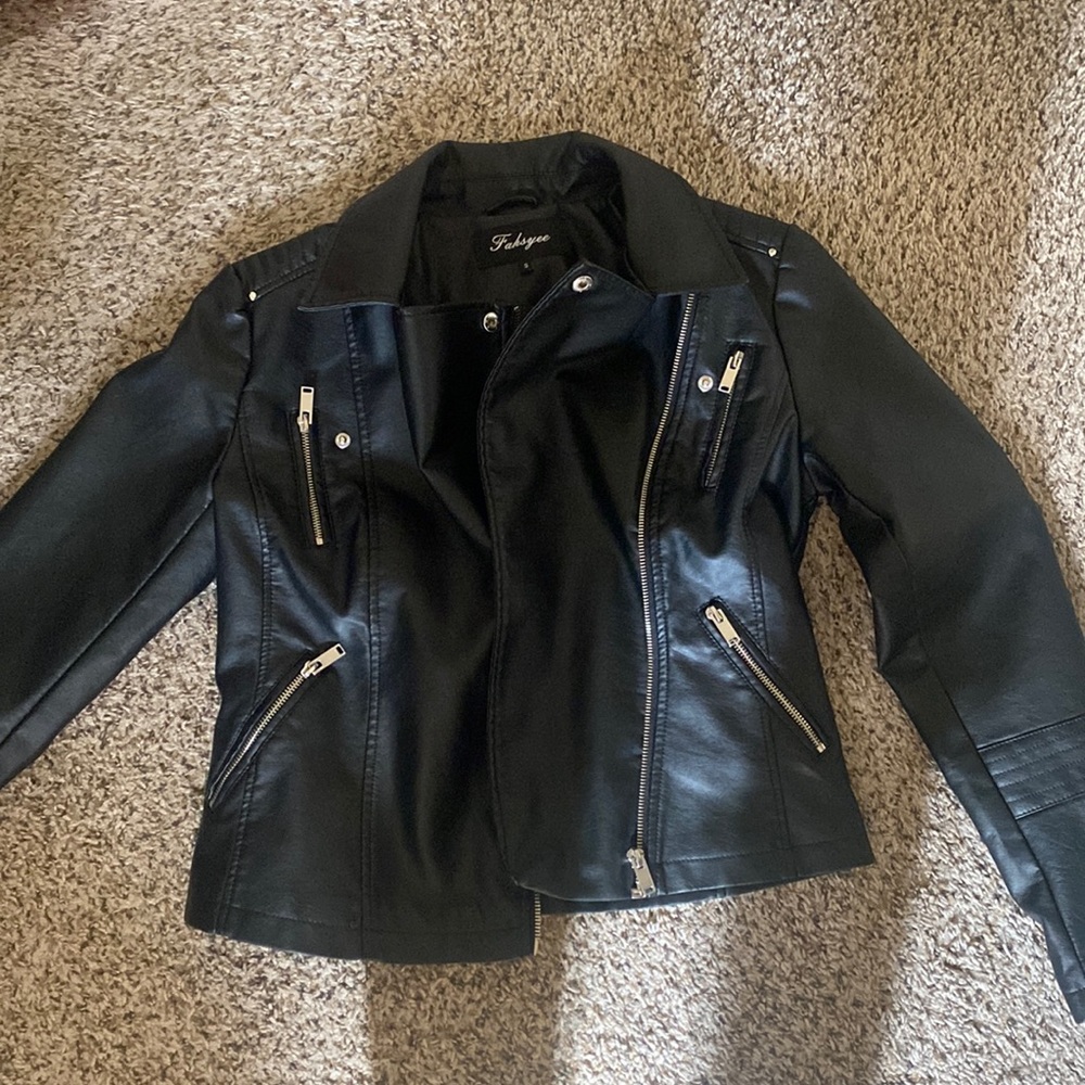 Leather jacket. Bought it off Amazon. Cute fit new condition